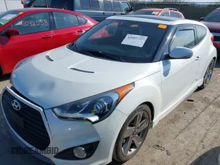 2015 Hyundai Veloster Turbo with VIN KMHTC6AE4FU234611, listed as a IAAI auction lot 42059915 with 107,388 mi miles. Bid and sale history available at carsss.com. Image 2.