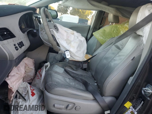 2012 Toyota Sienna XLE with VIN 5TDDK3DC1CS030952, listed as a Copart auction lot 85480444 with 222,158 mi miles and Salvage Title. Bid and sale history available at carsss.com. Image 7.