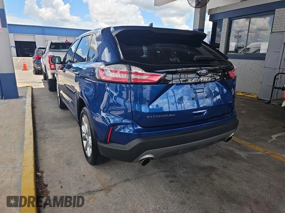 2021 Ford Edge Titanium with VIN 2FMPK3K98MBA53776, listed as a IAAI auction lot 42785493 with 114,856 mi miles and . Bid and sale history available at DreamBid. Image 6.