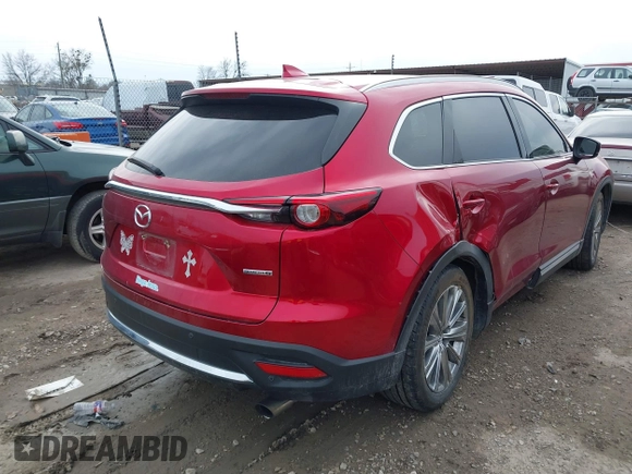 2021 Mazda CX-9 Signature with VIN JM3TCBEY0M0502938, listed as a IAAI auction lot 41734208 with 59,375 mi miles and . Bid and sale history available at carsss.com. Image 4.