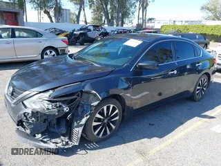 2018 Nissan Altima SR with VIN 1N4AL3AP3JC205780, listed as a IAAI auction lot 41921404 with 109,863 mi miles and . Bid and sale history available at carsss.com. Image 2.