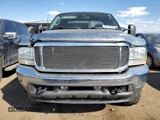 2003 Ford F-250 XL z VIN 1FTNX21PX3EB94715, wystawiony jako Copart lot #50712735 z przebiegiem 96 293 mil mil oraz Szkoda całkowita • Salvage title. Historia ofert i sprzedaży dostępna na DreamBid. Obrazek 5.