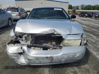 2001 Mercury Grand Marquis LS z VIN 2MEFM75W31X704781, wystawiony jako Copart lot #54613735 z przebiegiem 191 323 mil mil oraz Szkody całkowita. Historia ofert i sprzedaży dostępna na DreamBid. Obrazek 5.
