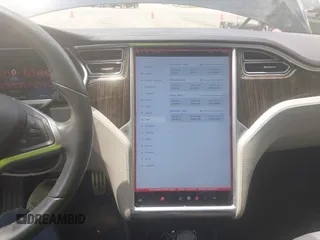 2013 Tesla Model S Performance z VIN 5YJSA1CP1DFP21827, wystawiony jako IAAI lot #42494897 z przebiegiem 148 150 mil mil oraz . Historia ofert i sprzedaży dostępna na DreamBid. Obrazek 19.