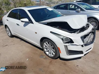 2015 Cadillac CTS with VIN 1G6AP5SX7F0139285, listed as a IAAI auction lot 41999355 with 34,709 mi miles and . Bid and sale history available at DreamBid. Image 1.