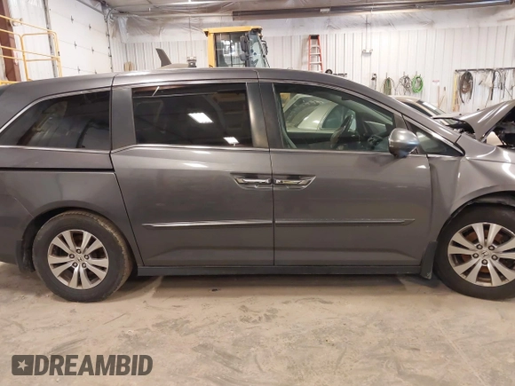 2016 Honda Odyssey SE with VIN 5FNRL5H38GB039652, listed as a IAAI auction lot 41985520 with Not Provided miles and . Bid and sale history available at DreamBid. Image 13.