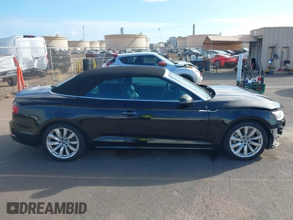 2018 Audi A5 Cabriolet Premium Plus z VIN WAUYNGF54JN008779, wystawiony jako IAAI lot #40763875 z przebiegiem 53 346 mil mil oraz . Historia ofert i sprzedaży dostępna na DreamBid. Obrazek 14.