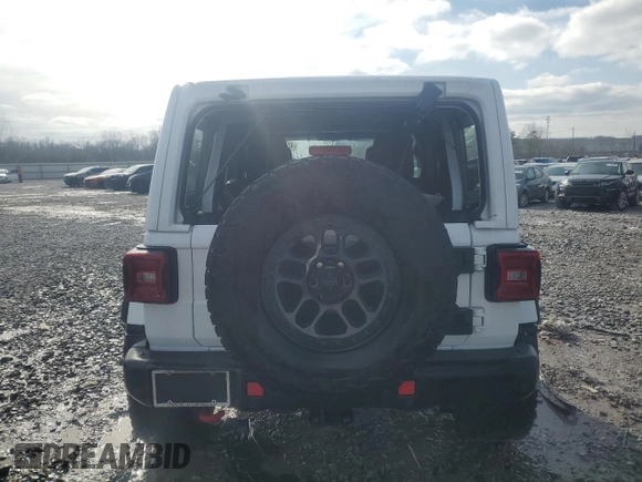 2021 Jeep Wrangler Unlimited Rubicon with VIN 1C4JJXFG1MW849460, listed as a Copart auction lot 45307515 with 54,517 mi miles and Salvage title. Bid and sale history available at DreamBid. Image 6.