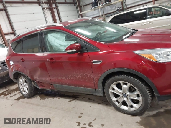 2014 Ford Escape Titanium with VIN 1FMCU9J9XEUA51732, listed as a IAAI auction lot 41542867 with 44,141 mi miles. Bid and sale history available at carsss.com. Image 13.