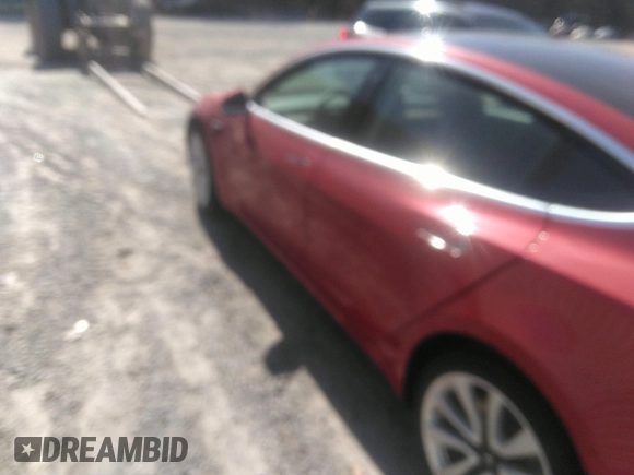 2020 Tesla Model 3 Standard Range Plus with VIN 5YJ3E1EA9LF708808, listed as a IAAI auction lot 40018323 with 32,069 mi miles. Bid and sale history available at carsss.com. Image 13.