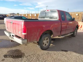 2001 Ford F-150 XL with VIN 1FTRX18L21NB46718, listed as a IAAI auction lot 41477101 with 156,702 mi miles. Bid and sale history available at carsss.com. Image 4.