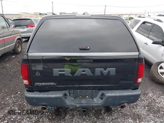 2016 Ram 1500 Rebel z VIN 1C6RR7YT0GS100285, wystawiony jako IAAI lot #42346719 z przebiegiem 103 309 mil mil oraz . Historia ofert i sprzedaży dostępna na DreamBid. Obrazek 16.