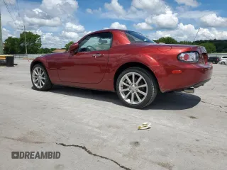 2008 Mazda MX-5 Miata Grand Touring z VIN JM1NC26F580144269, wystawiony jako Copart lot #56586405 z przebiegiem 52 871 mil mil oraz Szkody całkowita. Historia ofert i sprzedaży dostępna na DreamBid. Obrazek 2.