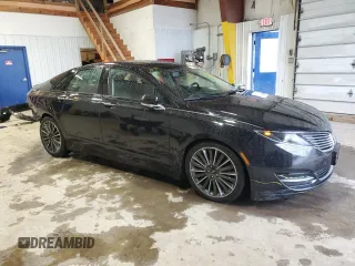 2016 Lincoln MKZ with VIN 3LN6L2JK4GR629425, listed as a Copart auction lot 52854645 with 127,981 mi miles and Salvage title. Bid and sale history available at DreamBid. Image 4.