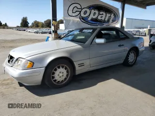 1997 Mercedes-Benz SL 500 with VIN WDBFA63F4VF151940, listed as a Copart auction lot 62199725 with 145,084 mi miles and Clean title. Bid and sale history available at DreamBid. Image 1.
