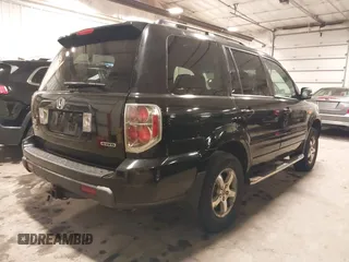 2007 Honda Pilot EX-L with VIN 5FNYF18677B017230, listed as a IAAI auction lot 41727853 with 257,527 mi miles and . Bid and sale history available at DreamBid. Image 4.