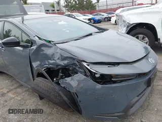 2024 Toyota Prius LE with VIN JTDACAAU9R3039099, listed as a IAAI auction lot 41384941 with 2,601 mi miles. Bid and sale history available at carsss.com. Image 6.