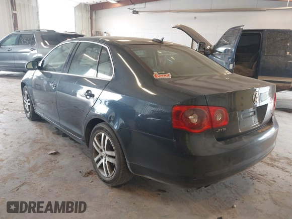 2006 Volkswagen Jetta 1.9L TDI z VIN 3VWDT71K26M624953, wystawiony jako IAAI lot #42420386 z przebiegiem 161 686 mil mil oraz . Historia ofert i sprzedaży dostępna na DreamBid. Obrazek 3.