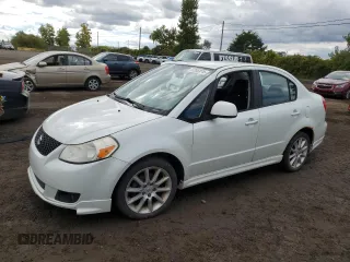 2009 Suzuki SX4 Convenience Pkg with VIN JS2YC415196200817, listed as a Copart auction lot 73355874 with 0 mi miles and Clean Title. Bid and sale history available at carsss.com. Image 1.