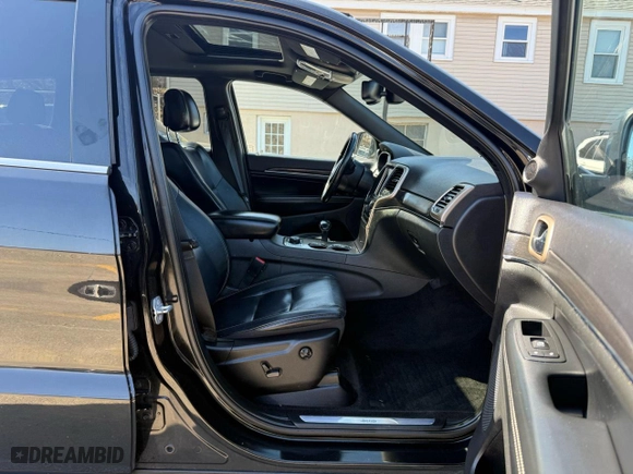 2015 Jeep Grand Cherokee Limited with VIN 1C4RJFBM4FC806566, listed as a Copart auction lot 49542775 with 143,770 mi miles and Clean Title. Bid and sale history available at carsss.com. Image 5.
