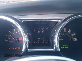 2009 Ford Mustang with VIN 1ZVHT80N795122341, listed as a Copart auction lot 80697973 with 123,219 mi miles and Salvage title. Bid and sale history available at DreamBid. Image 9.