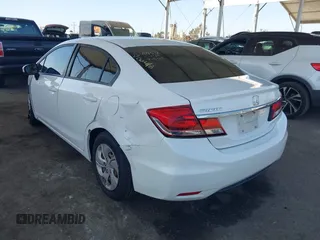 2015 Honda Civic Sedan LX with VIN 19XFB2E56FE060580, listed as a IAAI auction lot 41988820 with 65,924 mi miles. Bid and sale history available at carsss.com. Image 3.