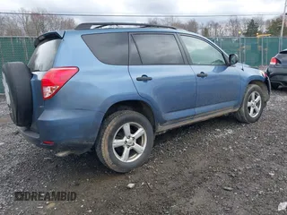 2006 Toyota RAV4 with VIN JTMBK33VX65003043, listed as a IAAI auction lot 42009844 with 294,380 mi miles. Bid and sale history available at carsss.com. Image 4.