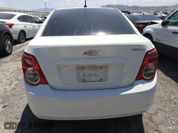 2012 Chevrolet Sonic LS z VIN 1G1JA5SH1C4193900, wystawiony jako Copart lot #59210175 z przebiegiem 92 235 mil mil oraz Szkoda całkowita • Salvage title. Historia ofert i sprzedaży dostępna na DreamBid. Obrazek 6.