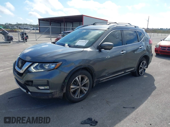 2018 Nissan Rogue S with VIN 5N1AT2MT9JC834646, listed as a IAAI auction lot 41224194 with 87,846 mi miles and . Bid and sale history available at carsss.com. Image 22.
