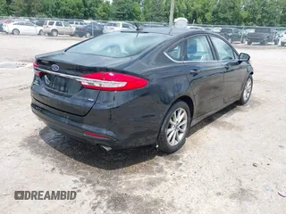 2017 Ford Fusion SE z VIN 3FA6P0H71HR363643, wystawiony jako IAAI lot #42764856 z przebiegiem 82 805 mil mil oraz . Historia ofert i sprzedaży dostępna na DreamBid. Obrazek 4.
