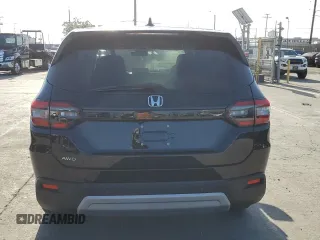 2025 Honda Pilot EX-L z VIN 5FNYG1H4XSB104401, wystawiony jako Copart lot #56923785 z przebiegiem 1 241 mil mil oraz Szkoda całkowita • Salvage title. Historia ofert i sprzedaży dostępna na DreamBid. Obrazek 6.