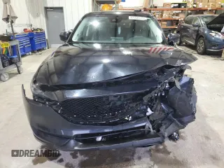2018 Mazda CX-5 Grand Touring with VIN JM3KFADM3J0325843, listed as a Copart auction lot 87958375 with 93,577 mi miles and Salvage title. Bid and sale history available at DreamBid. Image 5.