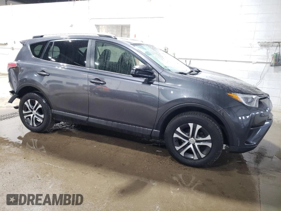 2016 Toyota RAV4 LE with VIN JTMBFREV3GD195188, listed as a Copart auction lot 52217295 with 113,808 mi miles and Salvage Title. Bid and sale history available at DreamBid. Image 4.