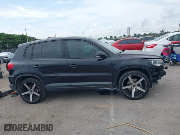 2014 Volkswagen Tiguan SE z VIN WVGAV3AXXEW535128, wystawiony jako IAAI lot #41882213 z przebiegiem 103 161 mil mil oraz . Historia ofert i sprzedaży dostępna na DreamBid. Obrazek 13.