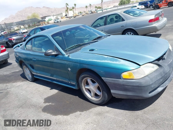 1997 Ford Mustang with VIN 1FALP4049VF200422, listed as a IAAI auction lot 42073947 with 157,937 mi miles. Bid and sale history available at carsss.com. Image 12.