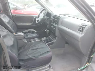 2002 Isuzu Rodeo S with VIN 4S2CK58W524322789, listed as a IAAI auction lot 41966033 with 251,311 mi miles. Bid and sale history available at carsss.com. Image 5.