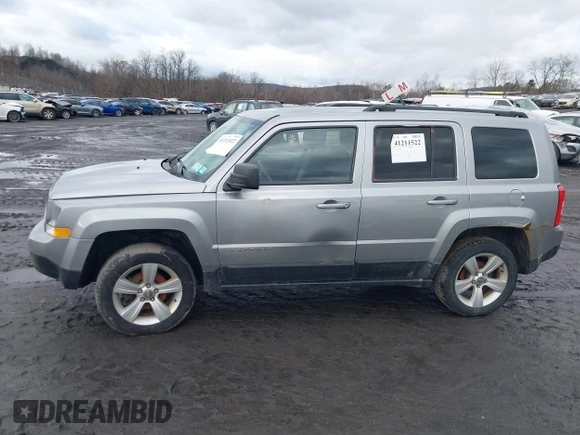 2014 Jeep Patriot Latitude with VIN 1C4NJRFB6ED778433, listed as a IAAI auction lot 41211522 with 127,506 mi miles. Bid and sale history available at carsss.com. Image 14.
