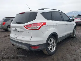 2015 Ford Escape SE with VIN 1FMCU9GX8FUC80918, listed as a IAAI auction lot 41694880 with 182,929 mi miles. Bid and sale history available at carsss.com. Image 6.