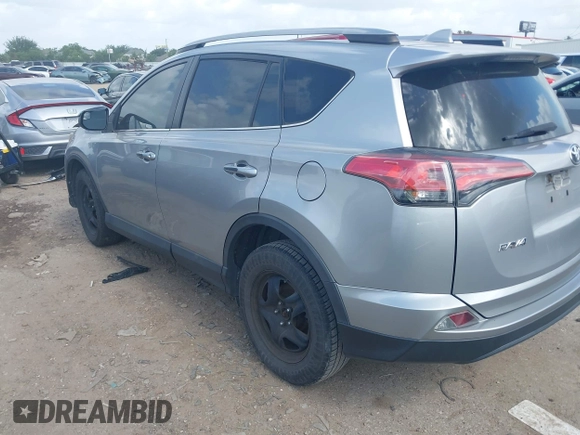 2018 Toyota RAV4 LE with VIN 2T3BFREV8JW758553, listed as a IAAI auction lot 42539300 with 116,337 mi miles and . Bid and sale history available at DreamBid. Image 3.