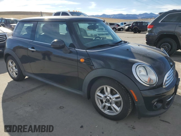 2012 MINI Hardtop with VIN WMWSU3C54CT255997, listed as a Copart auction lot 49162435 with 87,708 mi miles and Salvage Title. Bid and sale history available at DreamBid. Image 4.