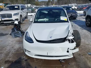 2022 Tesla Model Y Long Range with VIN 7SAYGDEE1NA013066, listed as a IAAI auction lot 41646912 with Not Provided miles and . Bid and sale history available at DreamBid. Image 12.