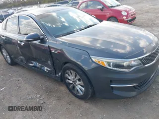2016 Kia Optima EX with VIN 5XXGU4L30GG014019, listed as a IAAI auction lot 41786540 with 112,894 mi miles and . Bid and sale history available at carsss.com. Image 1.