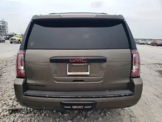 2016 GMC Yukon Denali with VIN 1GKS1CKJ6GR241889, listed as a Copart auction lot 67661734 with 0 mi miles and Salvage Title. Bid and sale history available at carsss.com. Image 6.