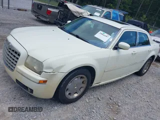 2006 Chrysler 300 Touring with VIN 2C3KA53G96H350490, listed as a IAAI auction lot 41319162 with 209,159 mi miles. Bid and sale history available at carsss.com. Image 2.
