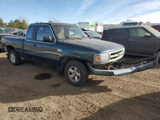 1997 Mazda B-Series 2WD Truck LE with VIN 4F4CR16X8VTM18932, listed as a Copart auction lot 85790044 with 114,262 mi miles and Salvage Title. Bid and sale history available at carsss.com. Image 4.