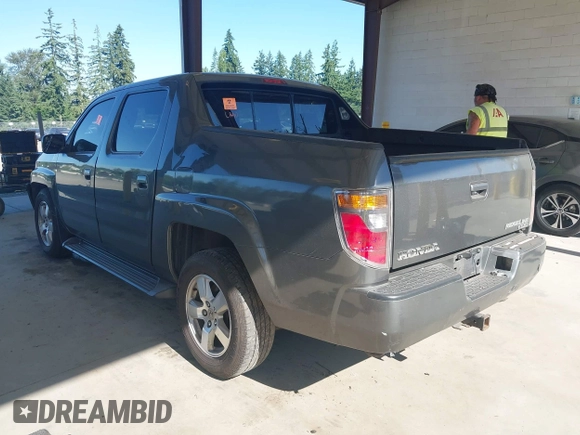 2007 Honda Ridgeline RTL with VIN 2HJYK16537H529904, listed as a IAAI auction lot 42626859 with 294,953 mi miles and . Bid and sale history available at DreamBid. Image 3.
