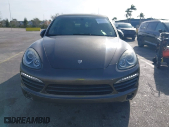 2011 Porsche Cayenne S Hybrid with VIN WP1AE2A29BLA94414, listed as a IAAI auction lot 41644386 with 76,095 mi miles. Bid and sale history available at carsss.com. Image 12.