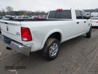 2016 Ram 2500 SLT with VIN 3C6TR5JT3GG258227, listed as a IAAI auction lot 41466434 with 77,950 mi miles and . Bid and sale history available at DreamBid. Image 4.