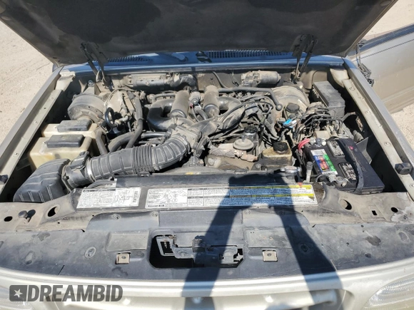 2000 Ford Explorer Sport with VIN 1FMYU60E3YUA95157, listed as a Copart auction lot 77214804 with 322,604 mi miles and Salvage title. Bid and sale history available at DreamBid. Image 12.