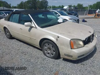 2000 Cadillac DeVille DTS z VIN 1G6KF5792YU216318, wystawiony jako IAAI lot #42134531 z przebiegiem 167 518 mil mil oraz . Historia ofert i sprzedaży dostępna na DreamBid. Obrazek 1.